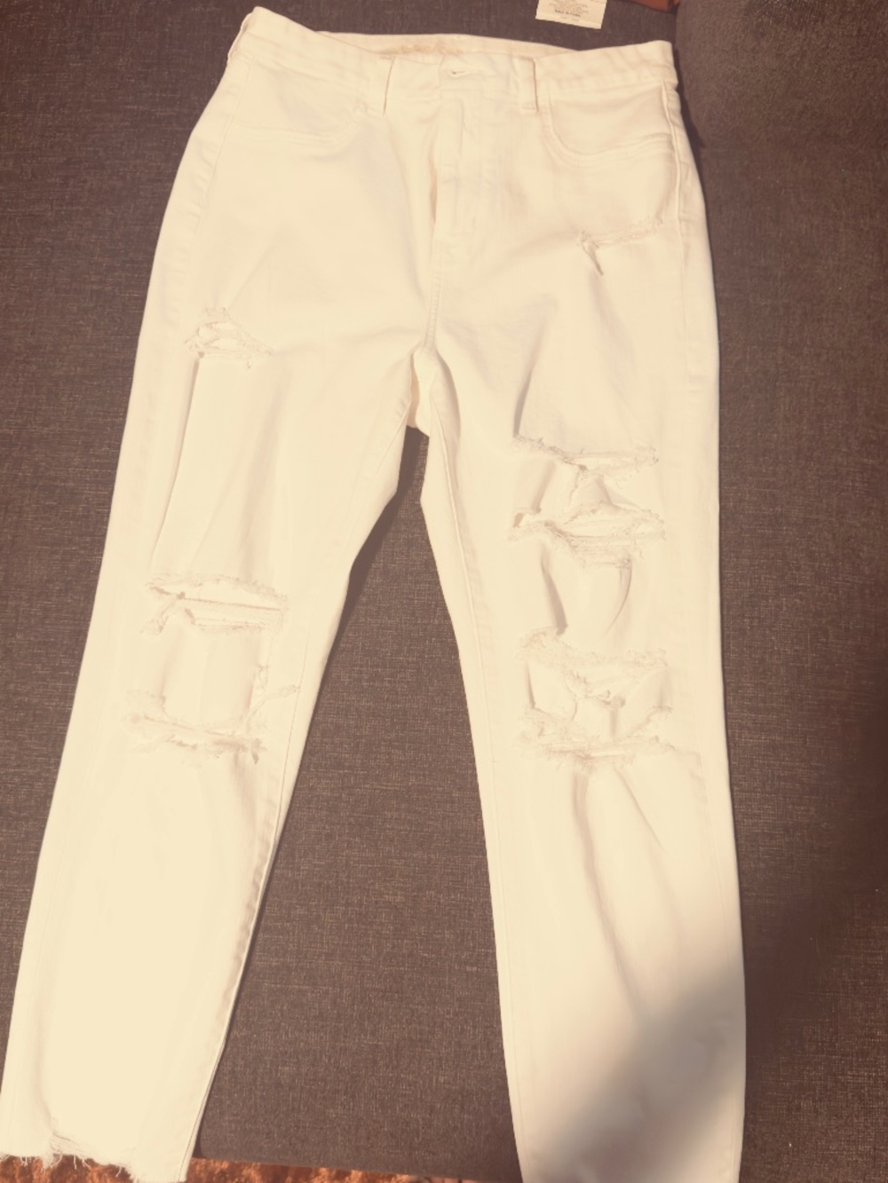 White distressed denim jeans